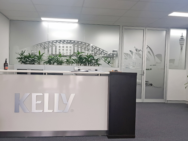 Kelly Group custom reception desk graphic and frosted windows